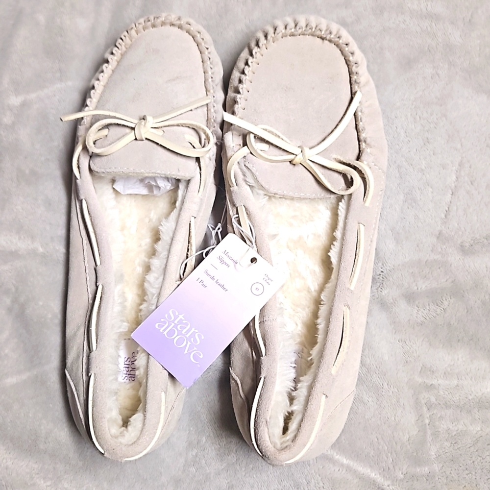 Brand new with tag women's moccasin slippers.